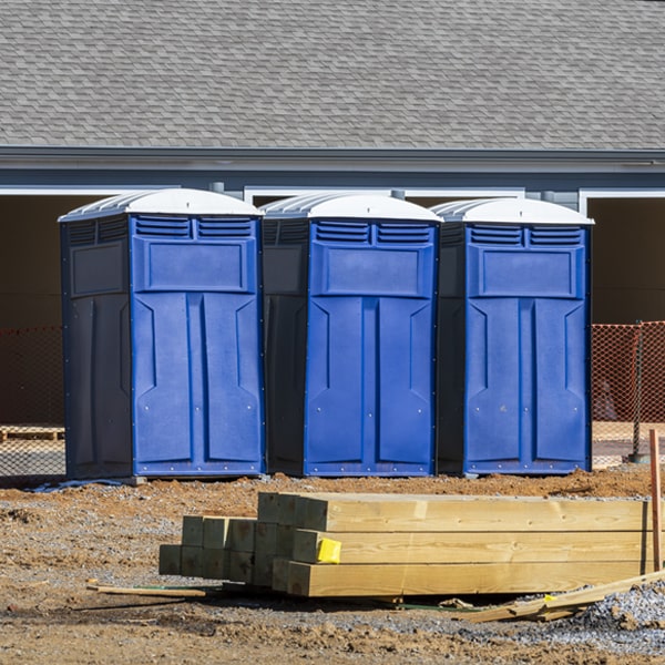 what is the cost difference between standard and deluxe porta potty rentals in Shepherd MI